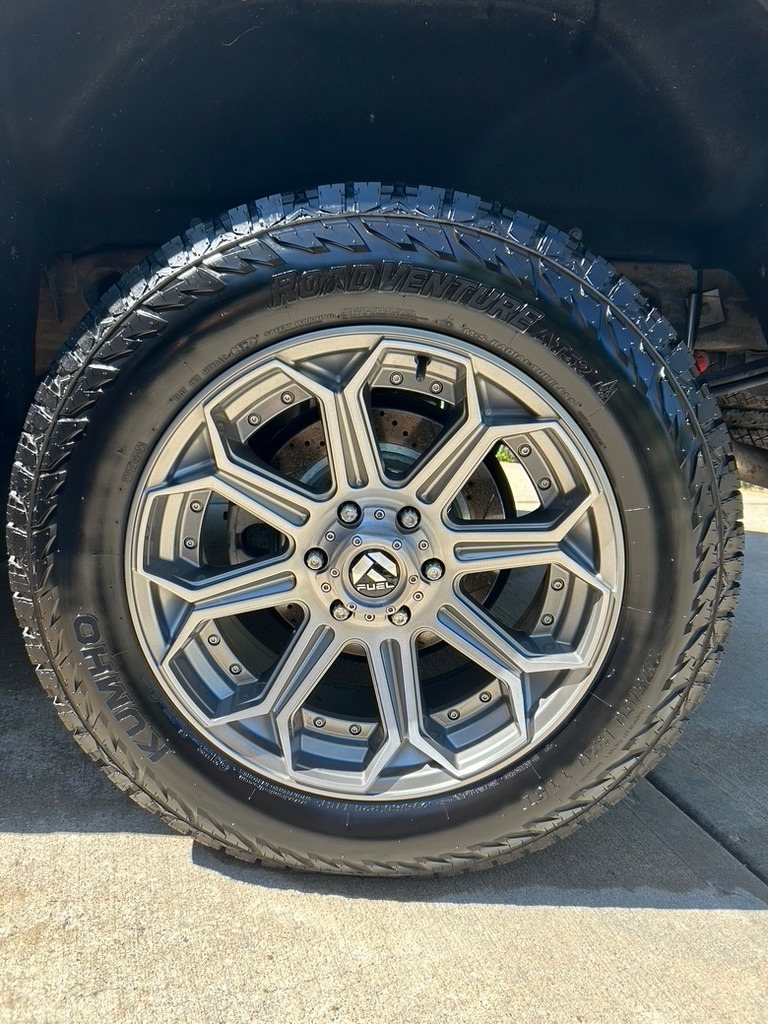 Clean truck wheel and dressed tire after a detail
