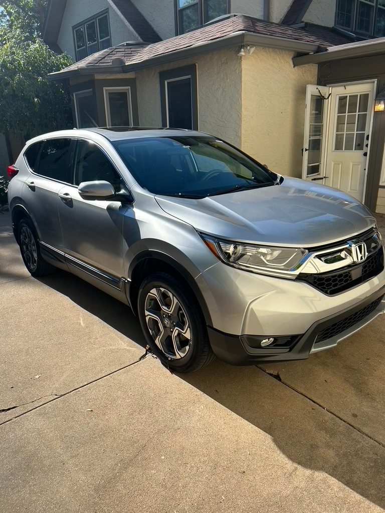 Silver Honda CR-V after a detail in a driveway