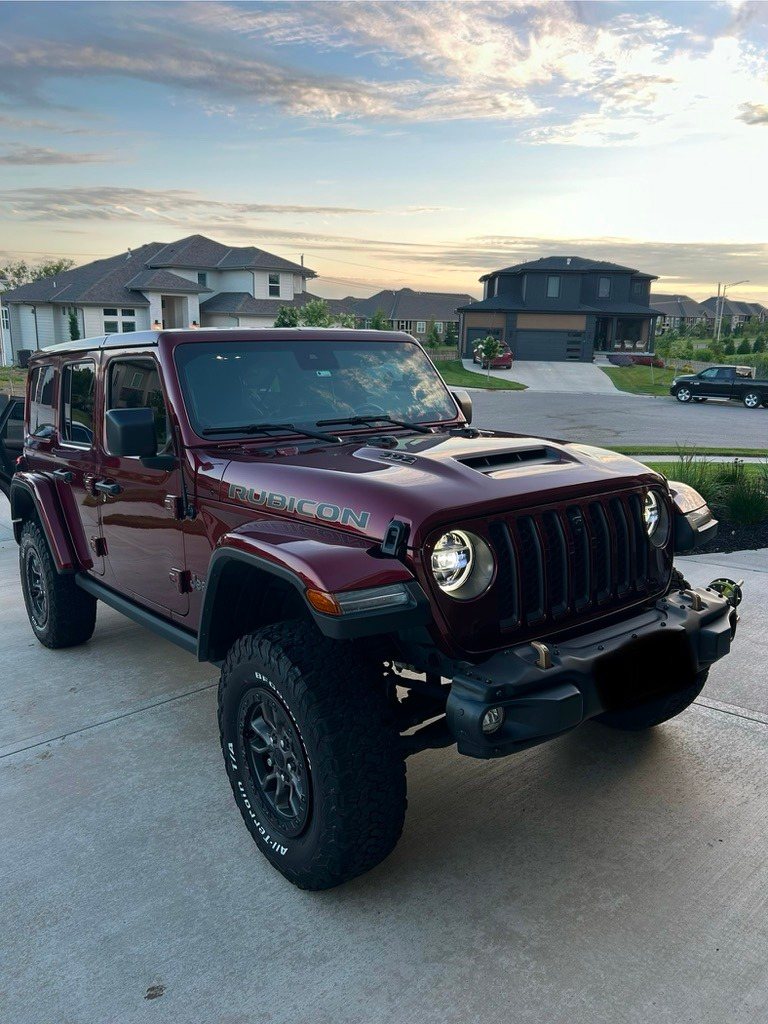 Maroon Jeep Wrangler Rubicon after a detail