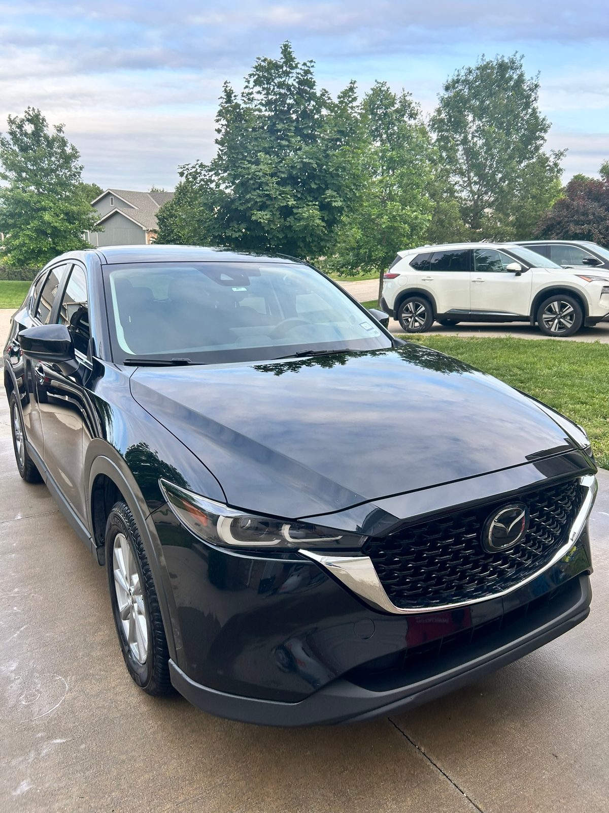 Black Mazda CX-5 with glossy paint after a mobile exterior detail