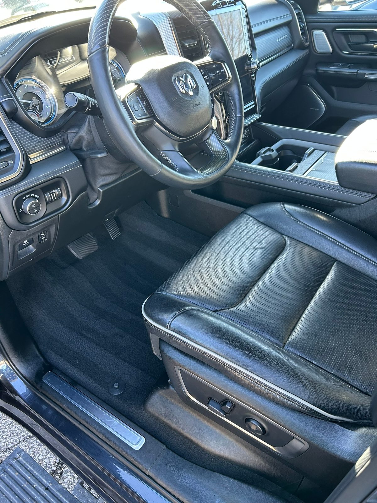 Ram 1500 Limited front seat and carpet after a mobile interior detail